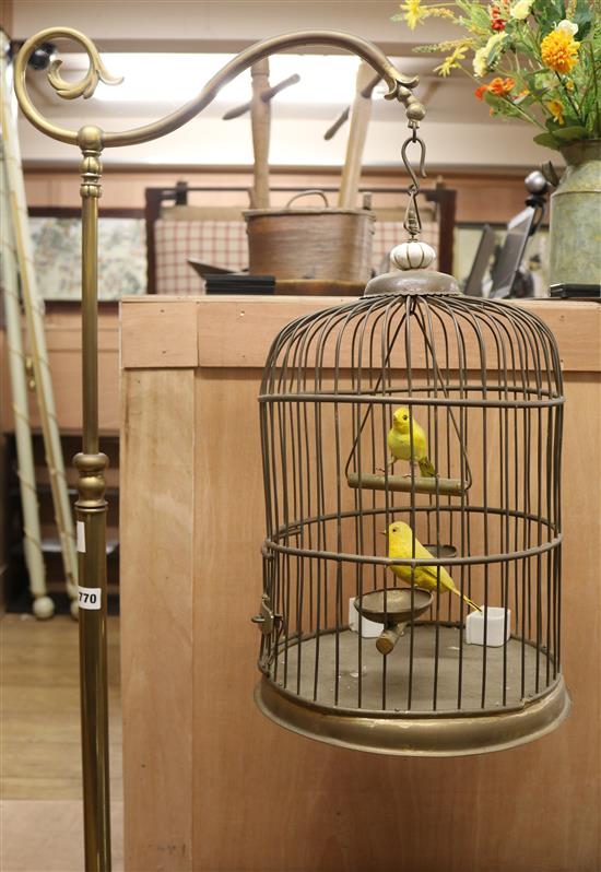 An early 20th century brass canary cage and stand, H.171cm